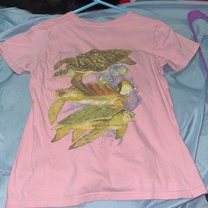 pink guy harvey shirt